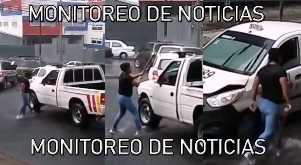 Mujer se sale de control por el tráfico y golpea con un bate a un carro en la zona 5 (Video)