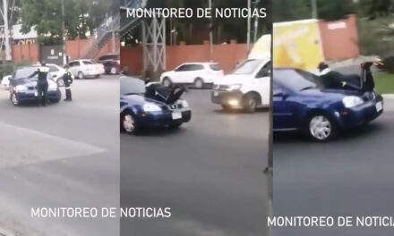 PMT trata de detener un vehículo pero no se detiene y el agente se sube encima del motor (Video)