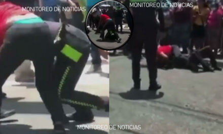 PMT Intentaba ponerle una multa a una mujer y terminan dándose a golpes (Vídeo)