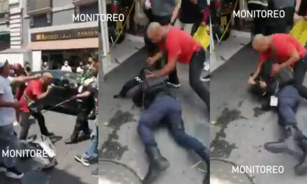 Hombre le da tremenda golpiza a policía que le querían poner cepo a su motocicleta (Video)