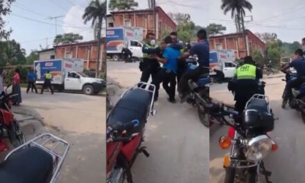 PMT se agarra a golpes con dos jóvenes que no querían pagar una multa (Video)