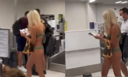 Captan a mujer casi sin ropa en aeropuerto (Video)