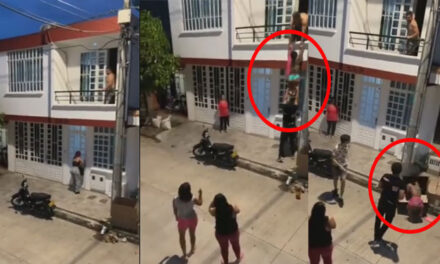 Hombre saca a su amante por el balcón con ayuda de los vecinos (Video)
