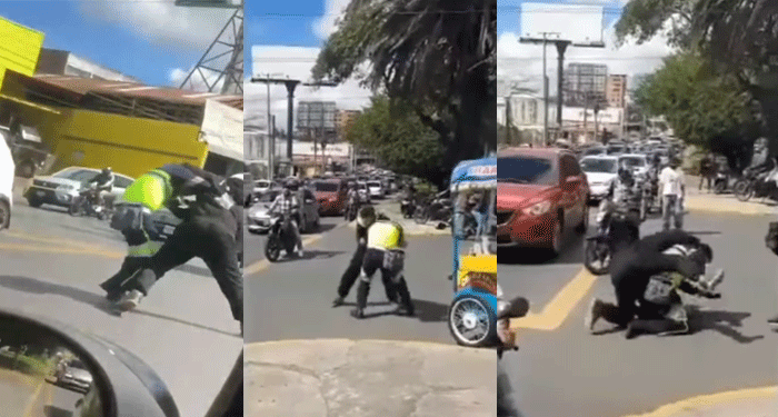 Fuerte pelea entre motorista y Agente de Tránsito por una fuerte multa (Video)