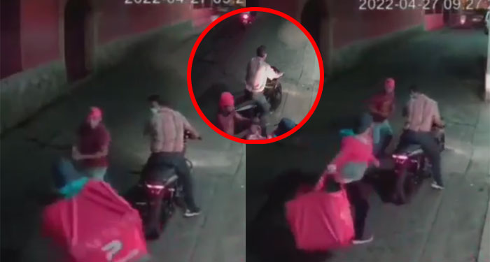 Momento en que repartidor de comida se enfrenta a golpes a dos motoladrones (Video)