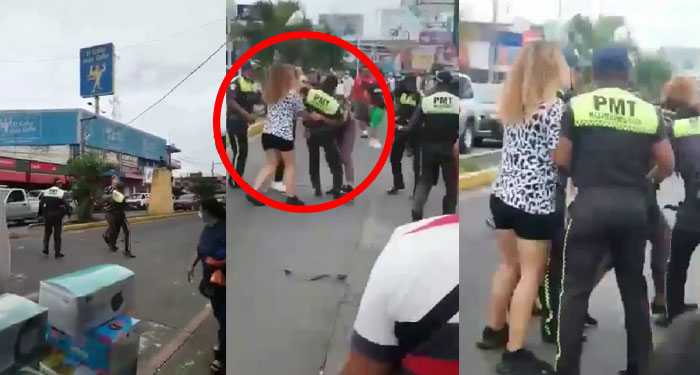 Momento exacto en motorista y PMT se van a los golpes por una fuerte multa (Video)