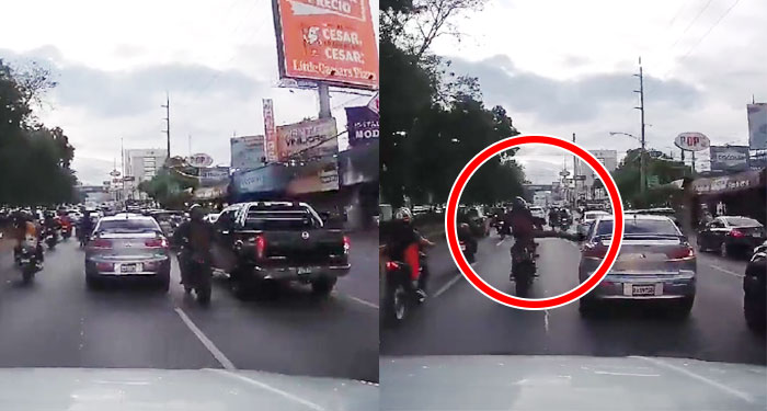 Momento en que motorista destruyó el retrovisor de un carro por no dejarlo pasar (Video)
