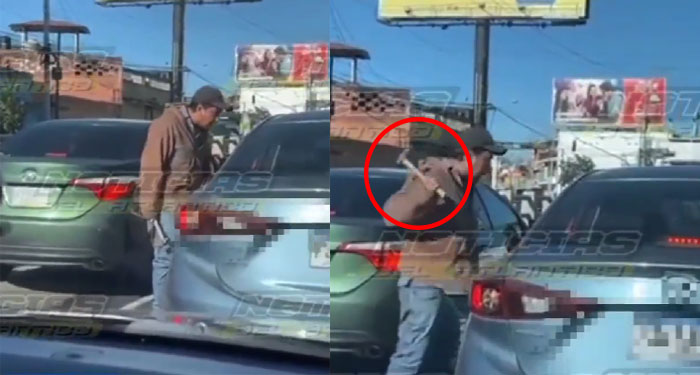 Taxista golpea con un martillo a un piloto por no darle vía (Video)