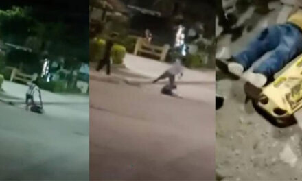 Momento en que adolescente mata a su padre con un palo en la vía pública (Video)