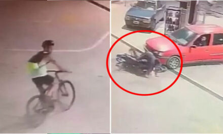 Momento en que conductor atropelló a un delincuente que intentaba asaltar a un ciclista (Video)