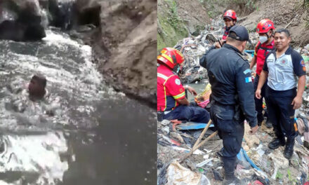 Momento en que Bombero se sumergió en aguas negras para rescatar un cuerpo (Video)