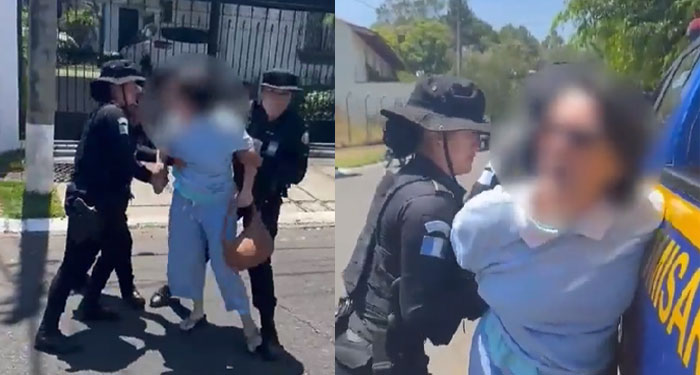 Momento en que mujer patea a agentes de la PNC cuando iba a ser desalojada en zona 15 (Video)