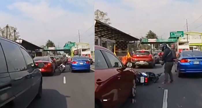Momento en que un motorista quiso patear el espejo de un carro y le salió mal (Video)