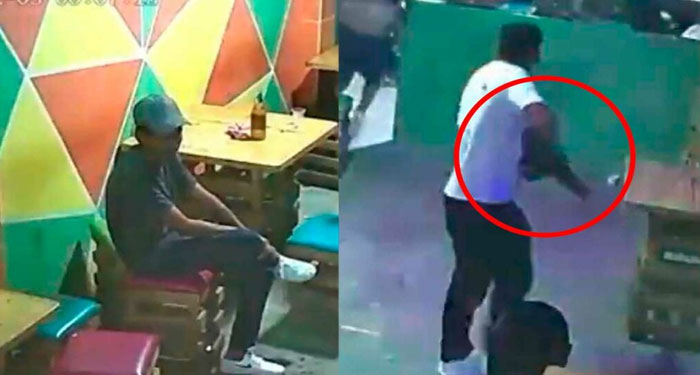 Hombre se esconde entre los bancos para no morir en tiroteo dentro de un bar (Video)